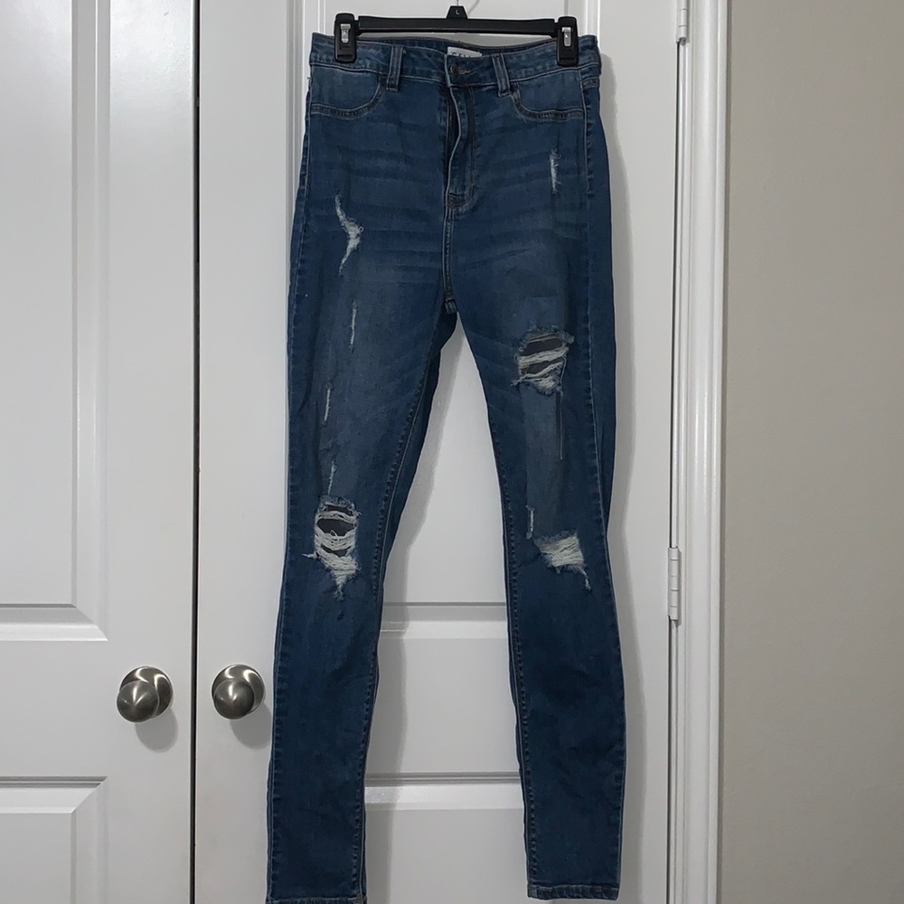 Skinny High waisted distressed medium wash jeans